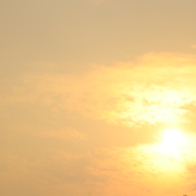 Sun light behind cloud