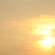 Sun light behind cloud